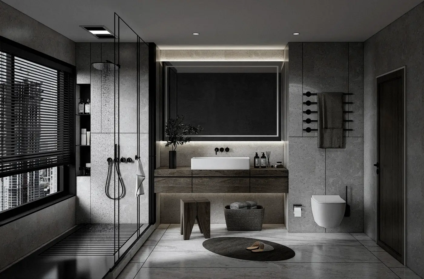 Salle de bain aux tons minéraux sombres : douche vitrée, vasque posée et banc